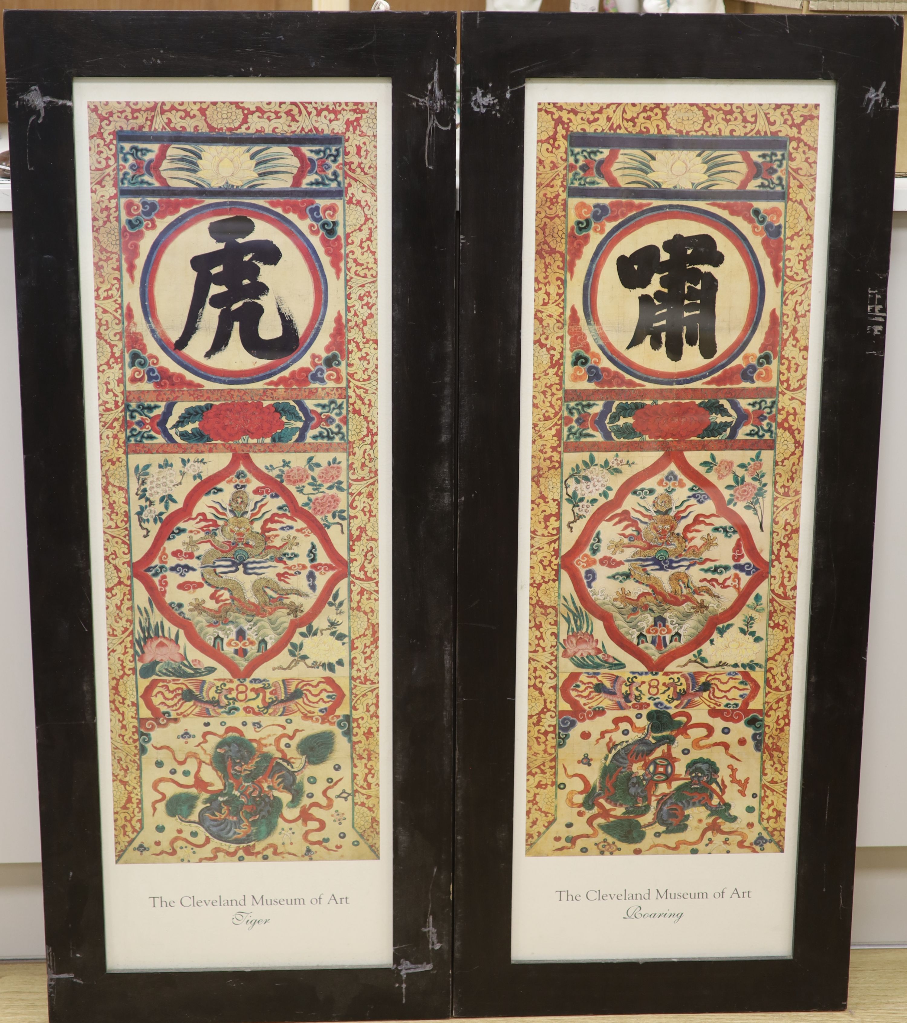 Two framed Cleveland Museum of Art colour prints of Chinese murals, Roaring and Tiger, 94 x 30cm